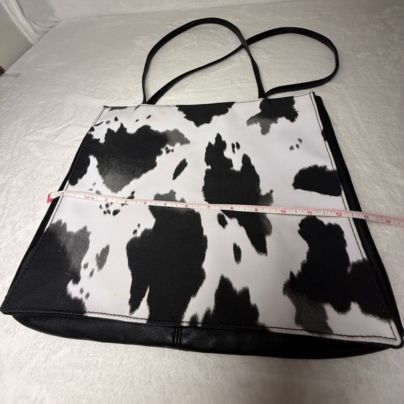 Cowprint Black and White Tote Bag with a Red Interior - Picture 5 of 7